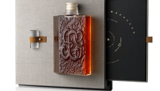 Box_lid_off_contents_on_white macallan 62 yo in lalique